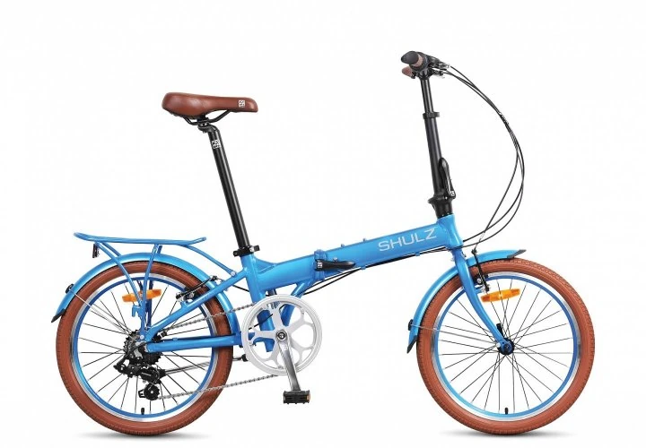Bicicleta plegable Shulz de color azul, un ejemplo de solución de movilidad urbana para guardar en la oficina o combinar con el transporte público.