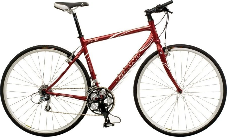 Bicicleta de ruta marca Giant en color rojo, un ejemplo de bicicleta de carretera diseñada con un cuadro fino y llantas delgadas para maximizar la velocidad en asfalto.