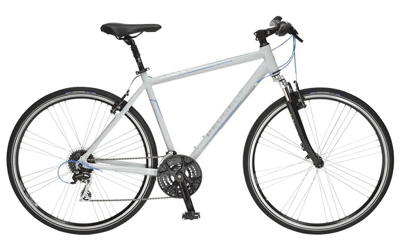 Ejemplo de una bicicleta híbrida urbana con suspensión delantera, diseñada para ofrecer una posición de manejo cómoda y absorber los baches de la ciudad.