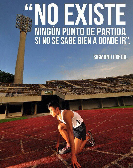 Frase de Sigmund Freud: "No existe ningún punto de partida si no se sabe bien a donde ir", sobre la importancia del propósito en la vida, ilustrada con un atleta en una pista.