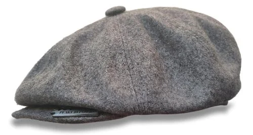 Elegancia Retro para un Estilo Inconfundible. Boina clásica estilo Gatsby de lana gris, un accesorio de moda retro para un look vintage y elegante.