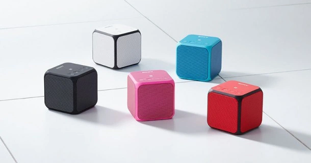 Parlantes portátiles Bluetooth de colores, modelo compacto ideal para 2025.